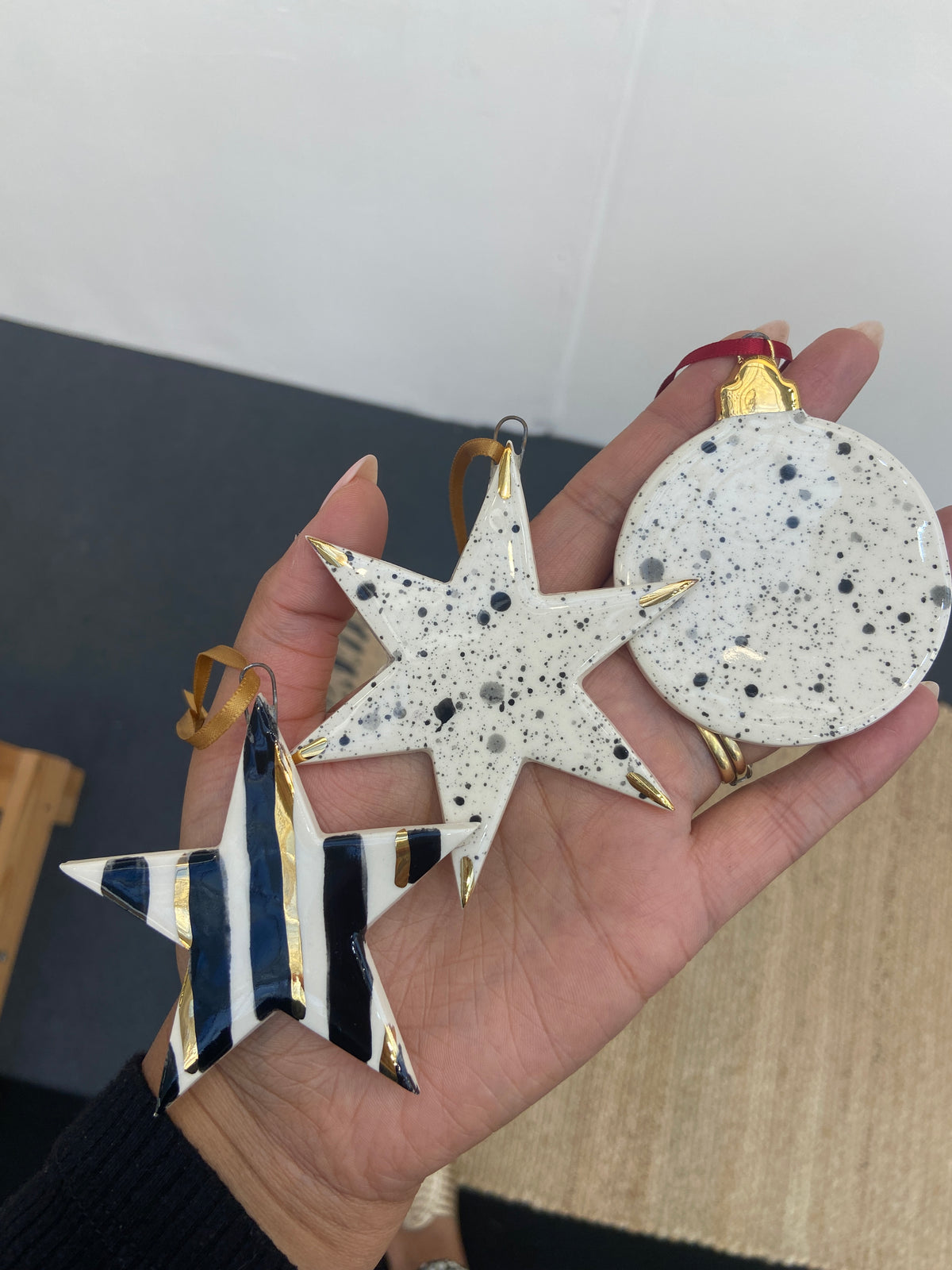 Stripy black and gold star ornament