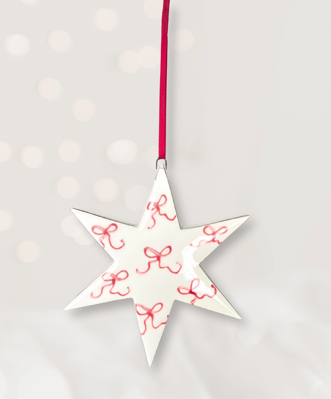 Ceramic Star with hand painted bows
