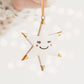 White Star Ceramic Ornament with eyelashes and Gold Tips
