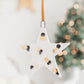Ceramic Star Ornament with Black and Gold Painted Pattern