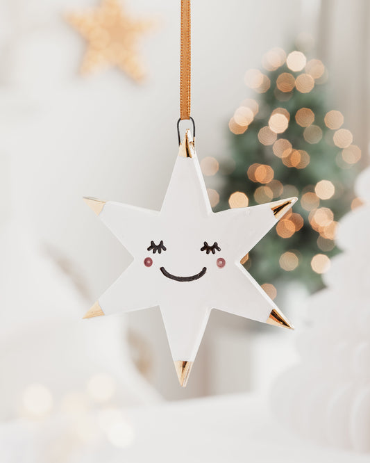 White Star Ceramic Ornament with eyelashes and Gold Tips