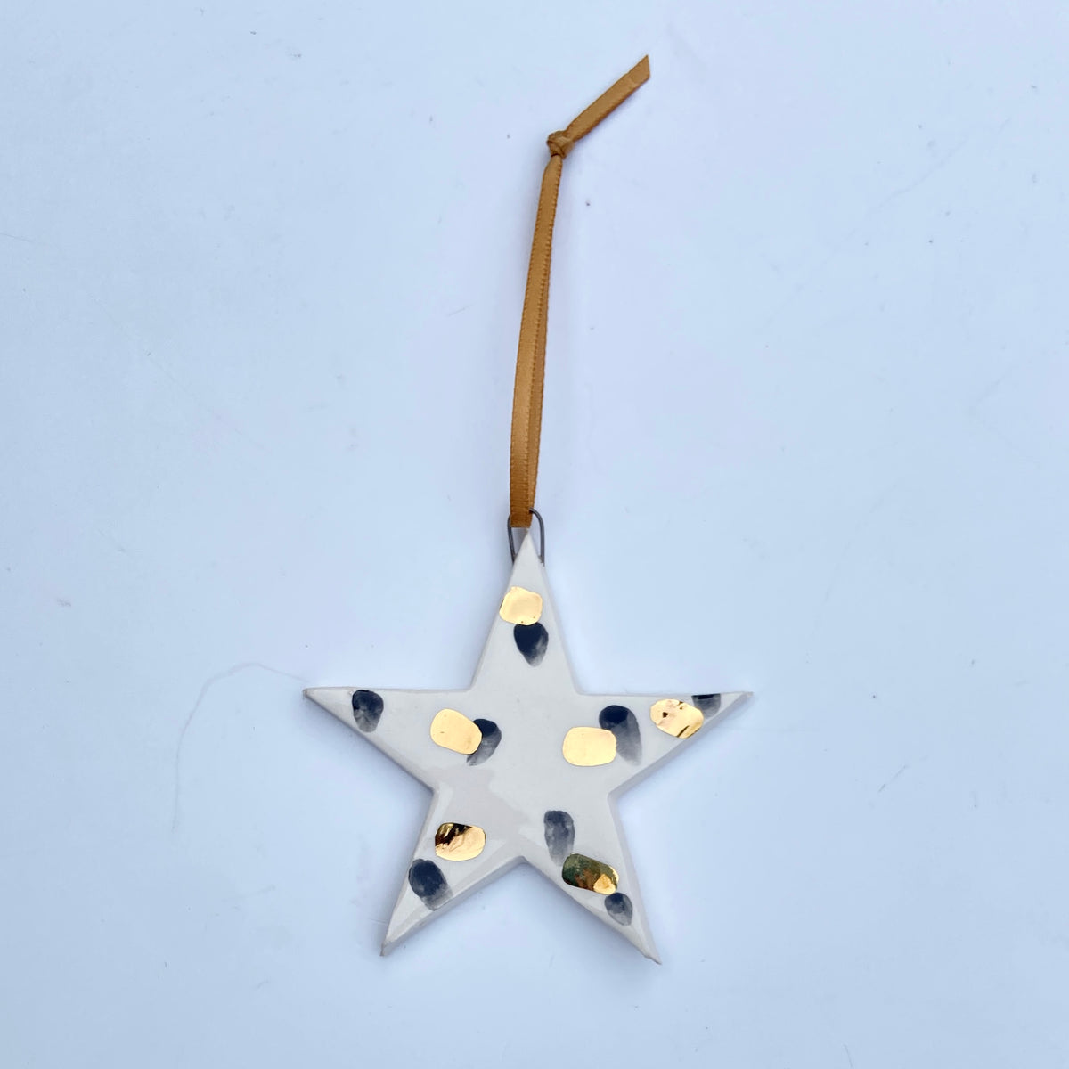 Ceramic Star Ornament with Black and Gold Painted Pattern